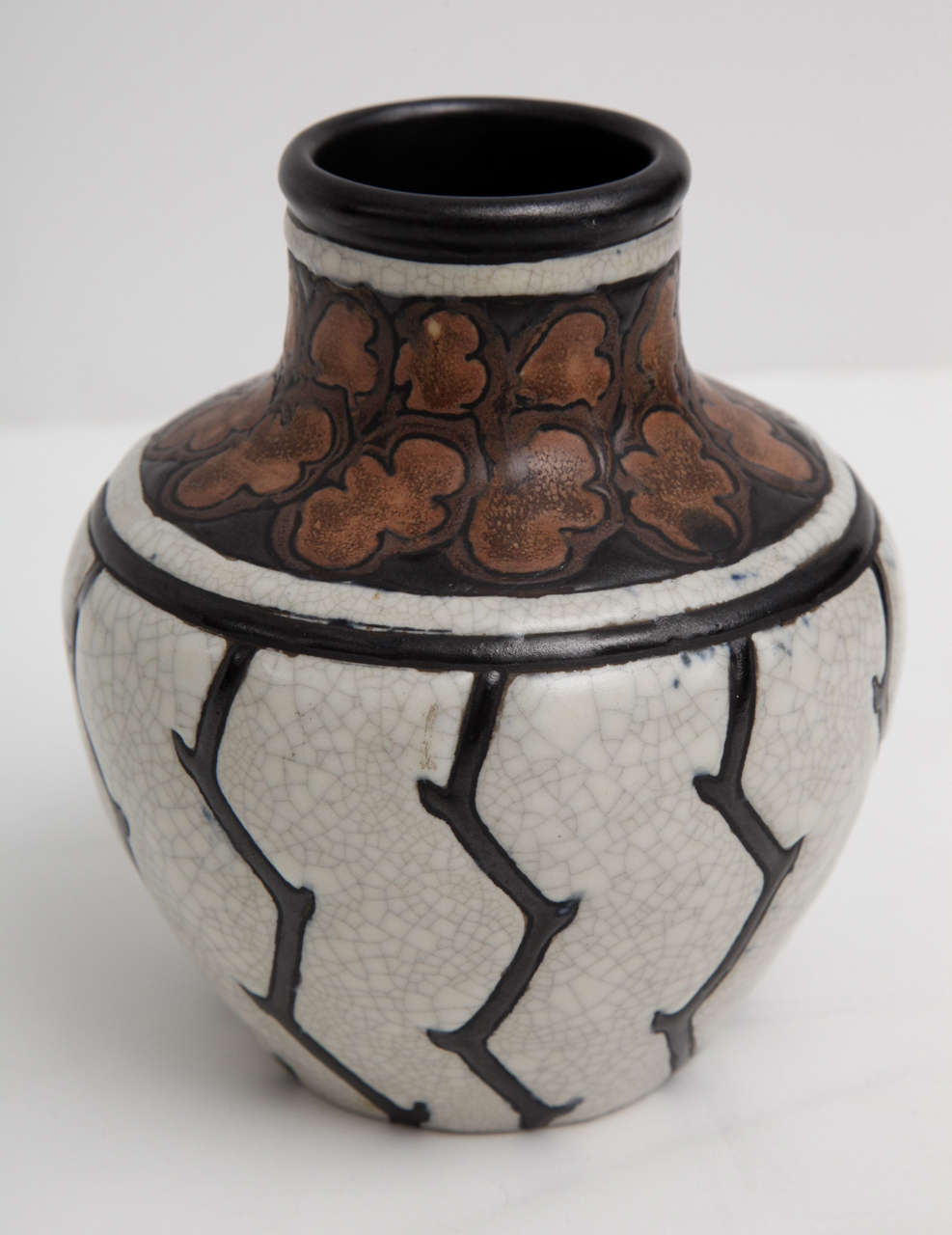 Glazed stoneware vase by Charles Catteau (1881-1966)

Marked Gres Keramis, 903 C
Stamped Boch Frères
Signed Ch. Catteau, D. 776.-