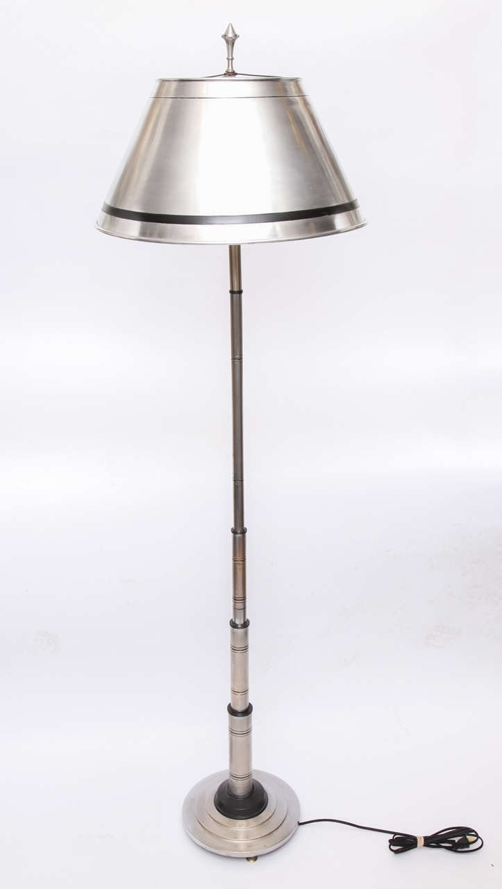 A 1930s American modernist floor lamp.