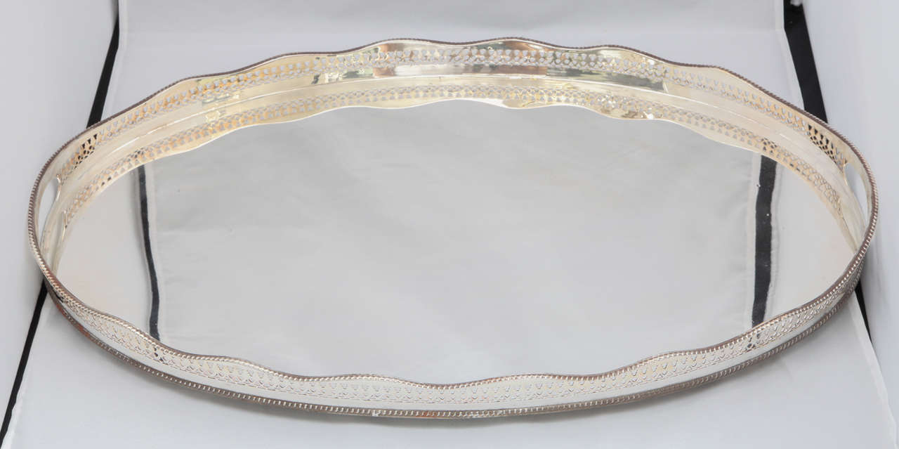 Very large, Sheffield-plated, footed gallery tray, England, Ca. 1920's. @24