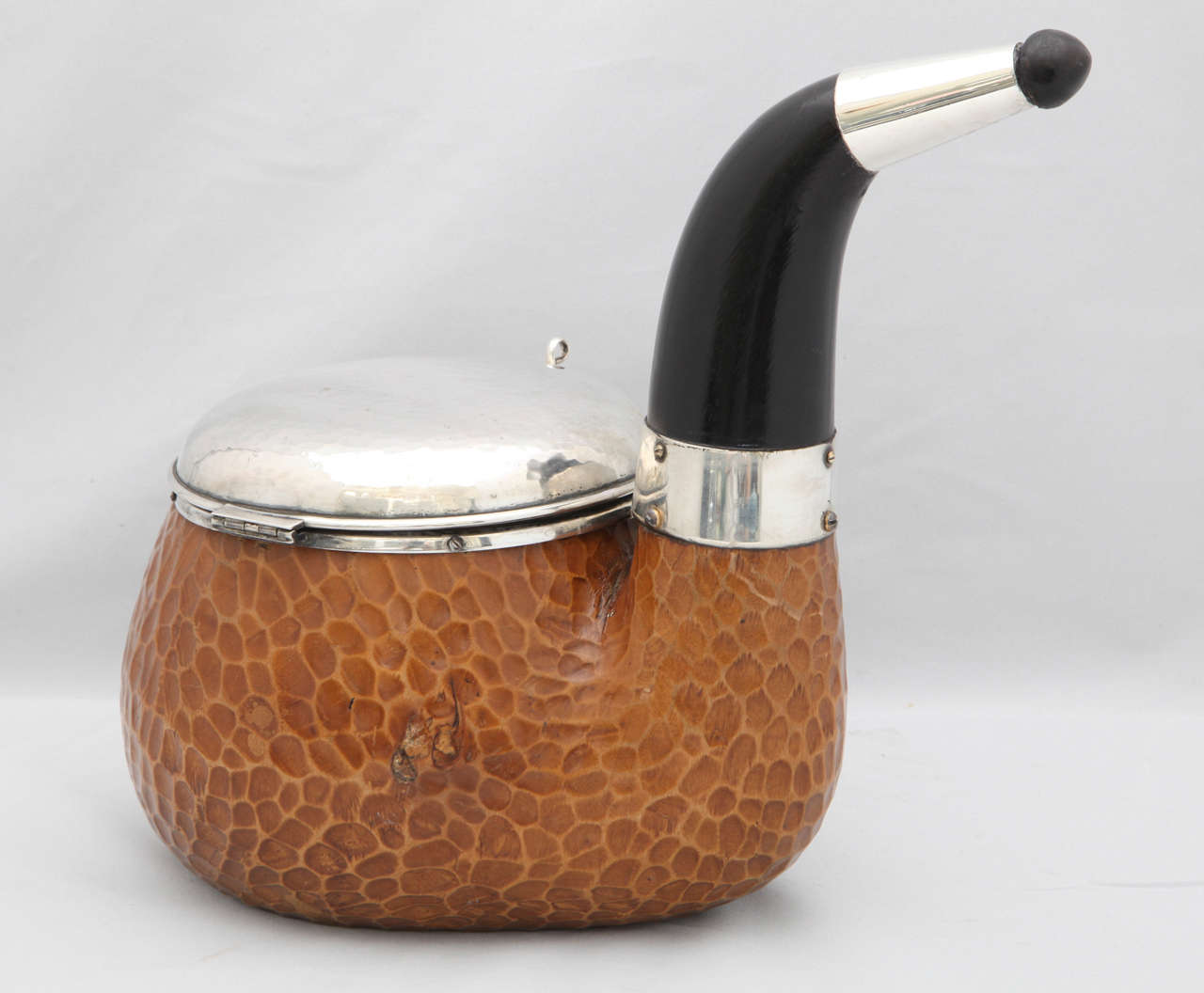 Very unusual, large, continental (.800) silver-mounted - wood, pipe-form humidor with hinged lid, Italy, circa 1940's. Measures: 11 1/2 inches wide x 9 1/2 inches high (at highest point) x 6 1/2 inches deep/diameter. Wood is carved so that it looks
