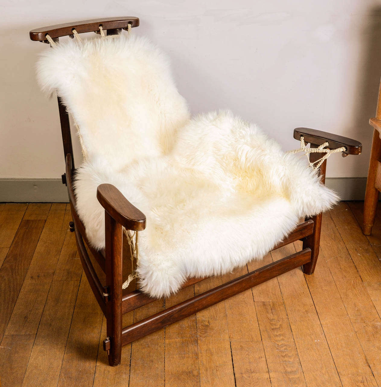 The famous Brazilian armchair and ottoman by Jean Gillon with wool cushion.