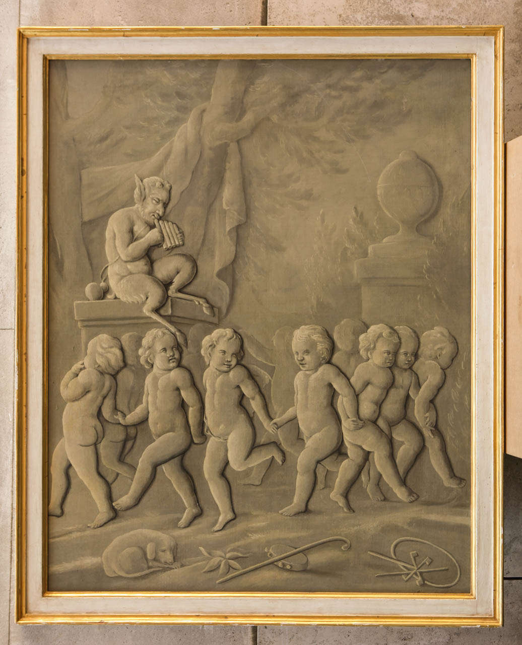 Late 18th century French Grisaille Painting, oil on canvas.
Mythological scene with the Greek God Pan and dancing putto figures with ivory painted and parcel gilt frame.
cm 165x135 with frame