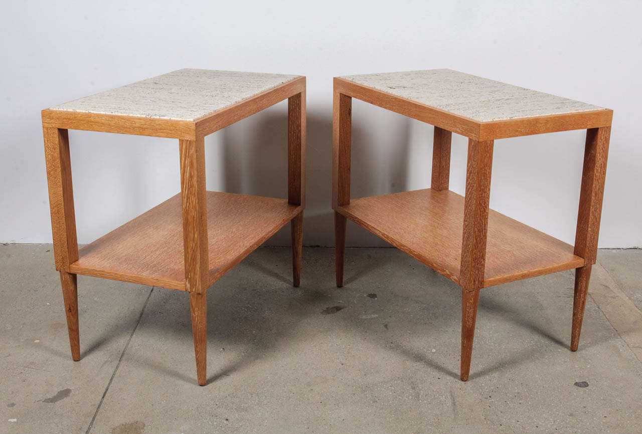Elegant geometric form of an oblong open prism atop tapering legs gives a floating effect. Original travertine tops show great character. French, 1940s.
Newly refinished to original character.

This item can be seen at our showroom, 1stDibs@NYDC,