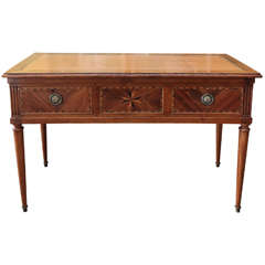 A French Walnut Writing Table with Star Inlay, circa 1800