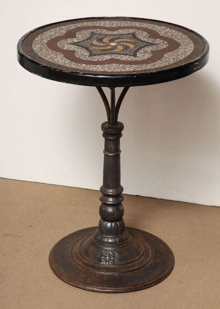 Pair of late 19th century English, steel tables with mosaic tops.