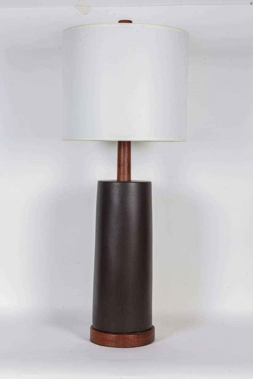 Fantastic pair of Dark Brown Matte Glazed lamps with Walnut bases, necks and finials. Designed by Gordon Martz.