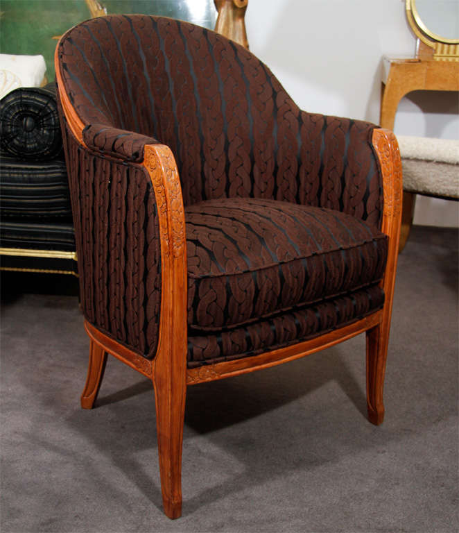 Pair of Fine & Early Richly Carved Fruitwood Art Deco Armchairs<br />
by Leon Jallot  (1874-1967) <br />
<br />
Provenance:  <br />
This set of furniture, comprised of a pair of armchairs, pair of side-chairs & matching round coffee table, was