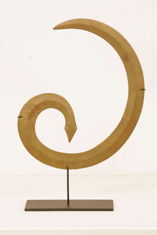 A pair of brass snakes