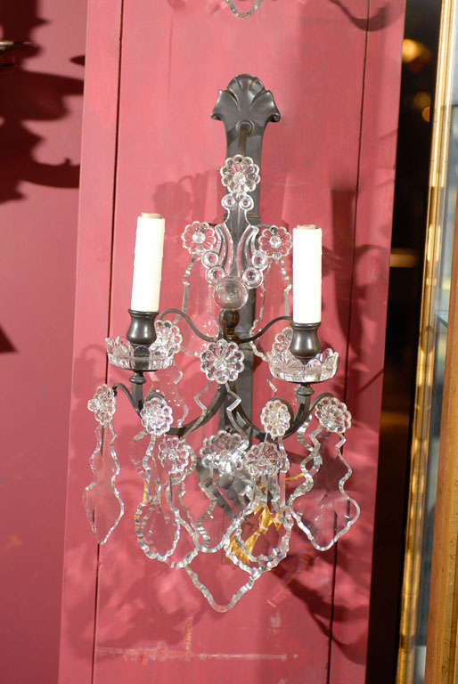 Very fine pair of bronze and crystal sconces by Baccarat