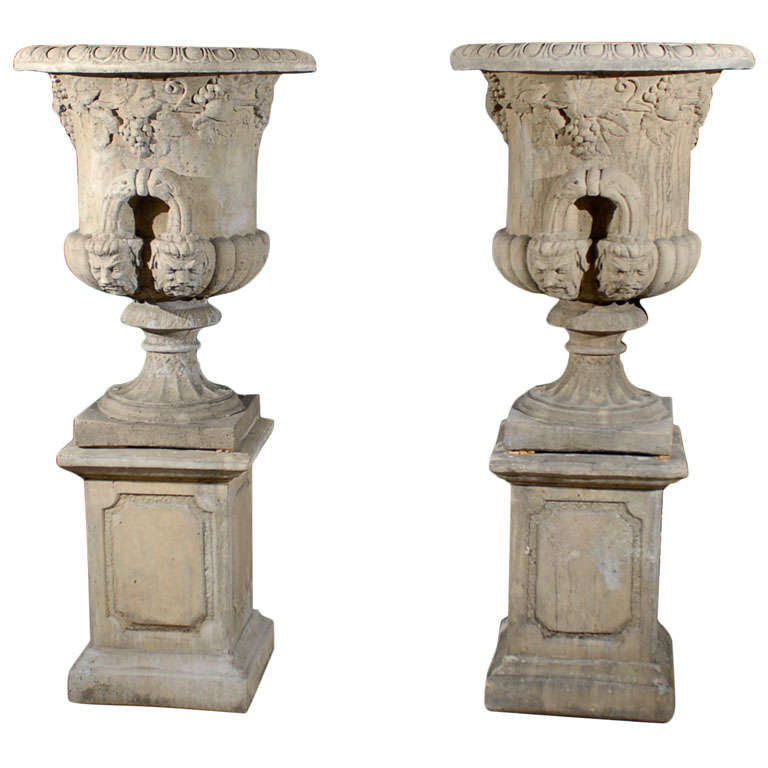 Pair of Urns on Pedestals