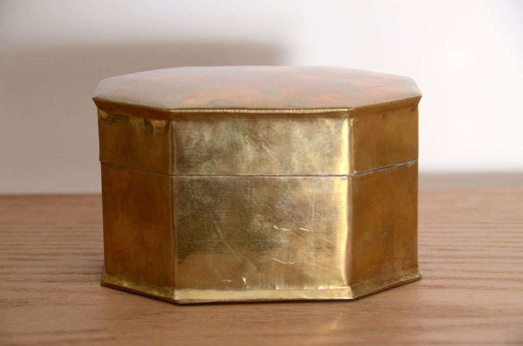 Small mid-century burnished brass octagonal shaped box with hinged lid.