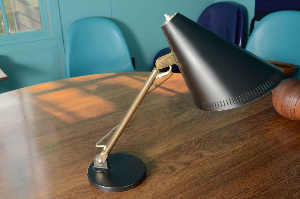 Conical Shade with Pierced rim.  Patinated Brass Shaft and Hinges.  Black base and Hood contrast niced with Brass.  Model Shade, Shaft and mechanisms are like Taito Table Lamp 9222.