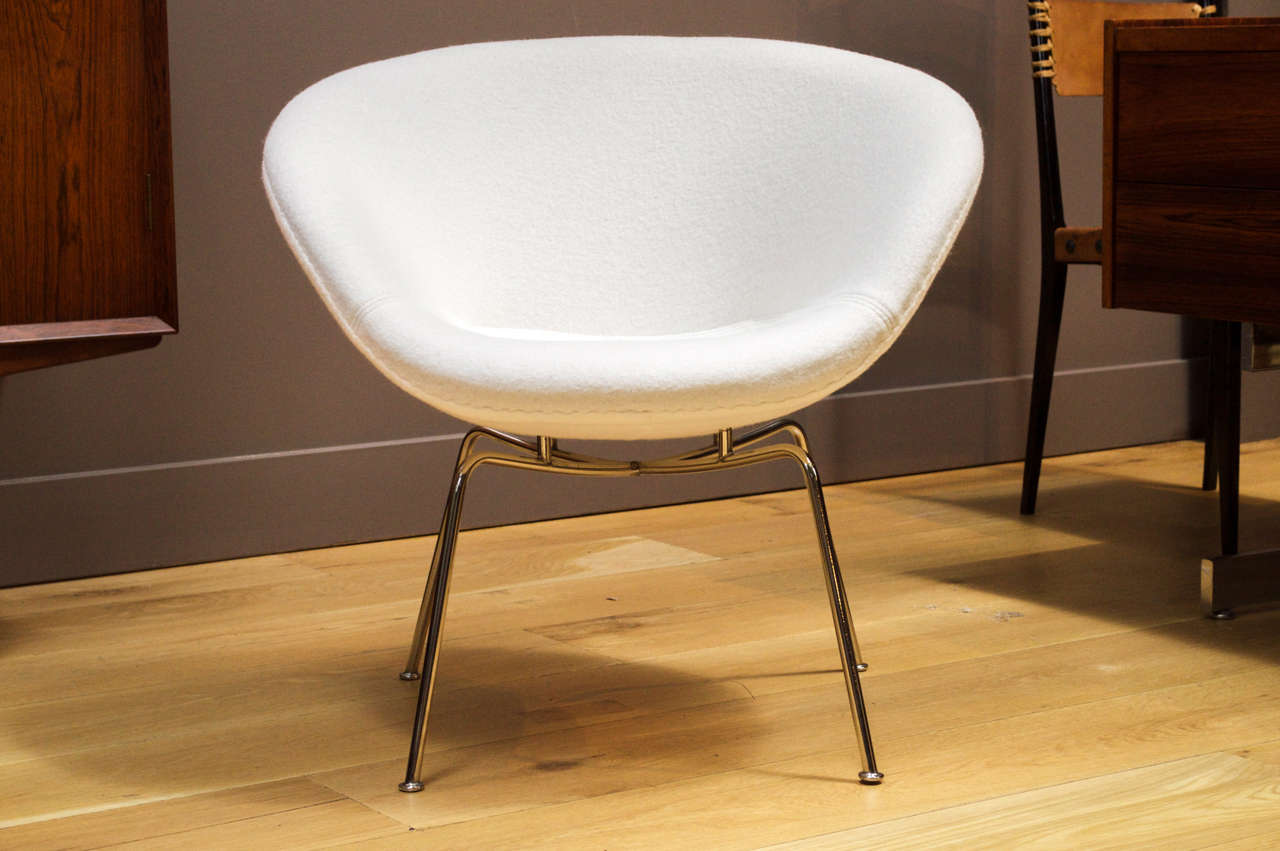 Arne Jacobsen model 3318th 'pot' chair upholstered with crisp white Holland and Sherry boiled wool, chromed tubular steel frame. Designed in 1959. Produced by Fritz Hansen.	 
Literature: Noritsuga Oda, 'Danish Chairs', reproduced and discussed p