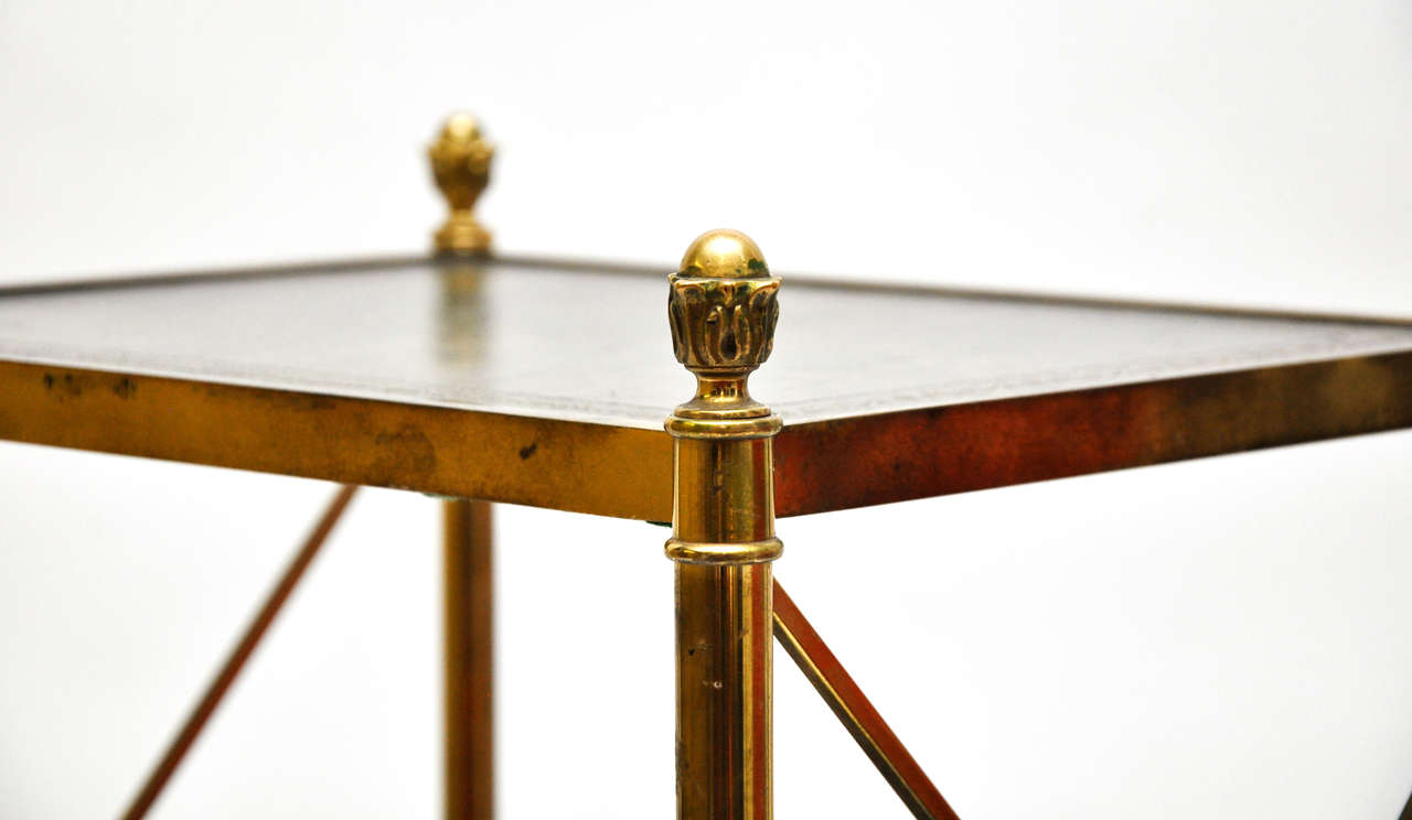 Mid-20th Century A Handsome Gilt-Brass and Bronze Etagere with Green Leather Inset Tops