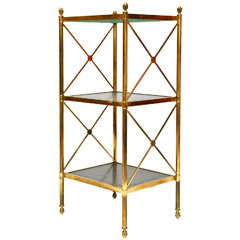 A Handsome Gilt-Brass and Bronze Etagere with Green Leather Inset Tops