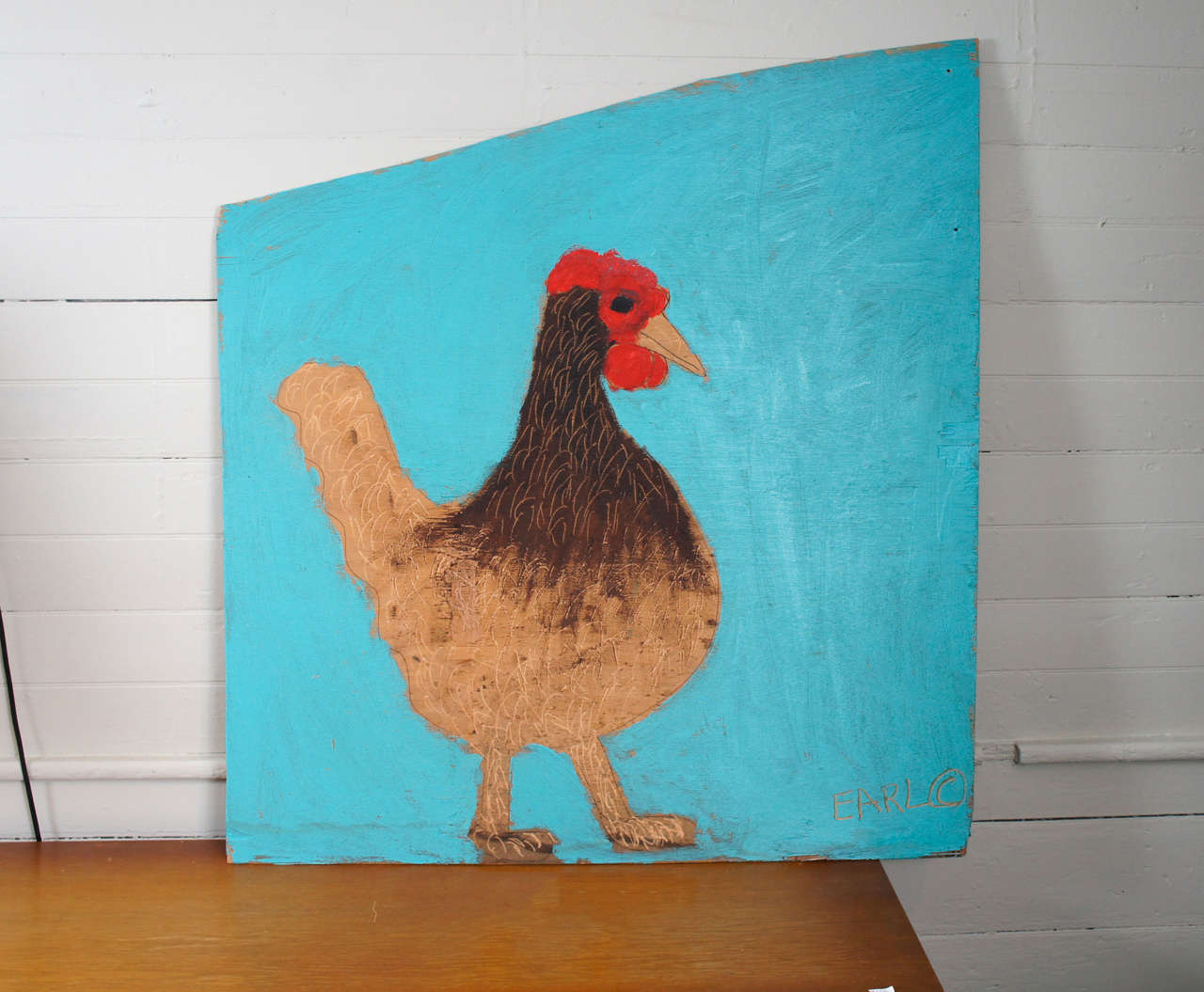 Painting on wooden board by folk artist Earl Swanigan. Strong, bright, playful image, with gestural strokes highlighted by incised markings. 