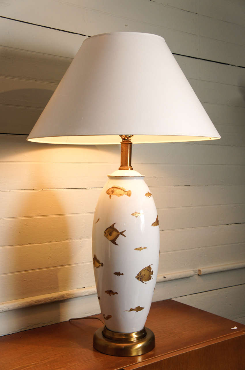 Single table lamp by L. Bernarduad and co.  Wonderful scale and design. Gilded and painted porcelain, with aquatic motif. Signed on bottom 