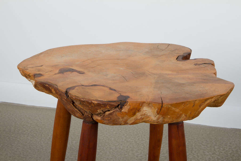 A wonderful, petite table with a free-edge single slab of walnut 