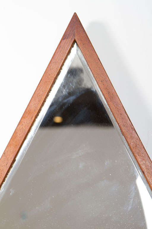 A pair of diamond frame mirrors in walnut with beveled glass mirror. By Edmund Spence. U.S.A., circa 1950s.