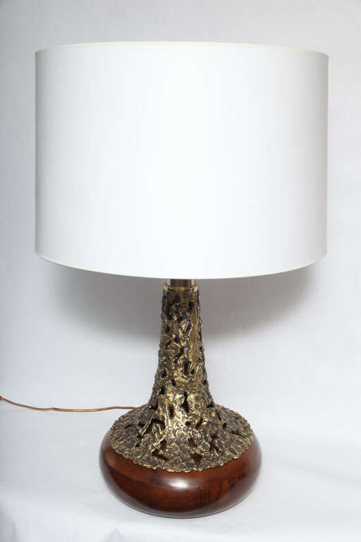 A 1960s Brutalist sculptural brass and wood table lamp.
New sockets and rewired
Shade not included
  
