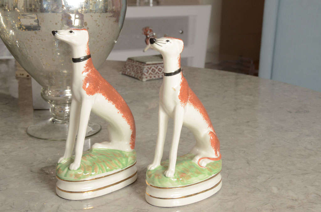 Attractive pair of painted porcelain Staffordshire spaniels
