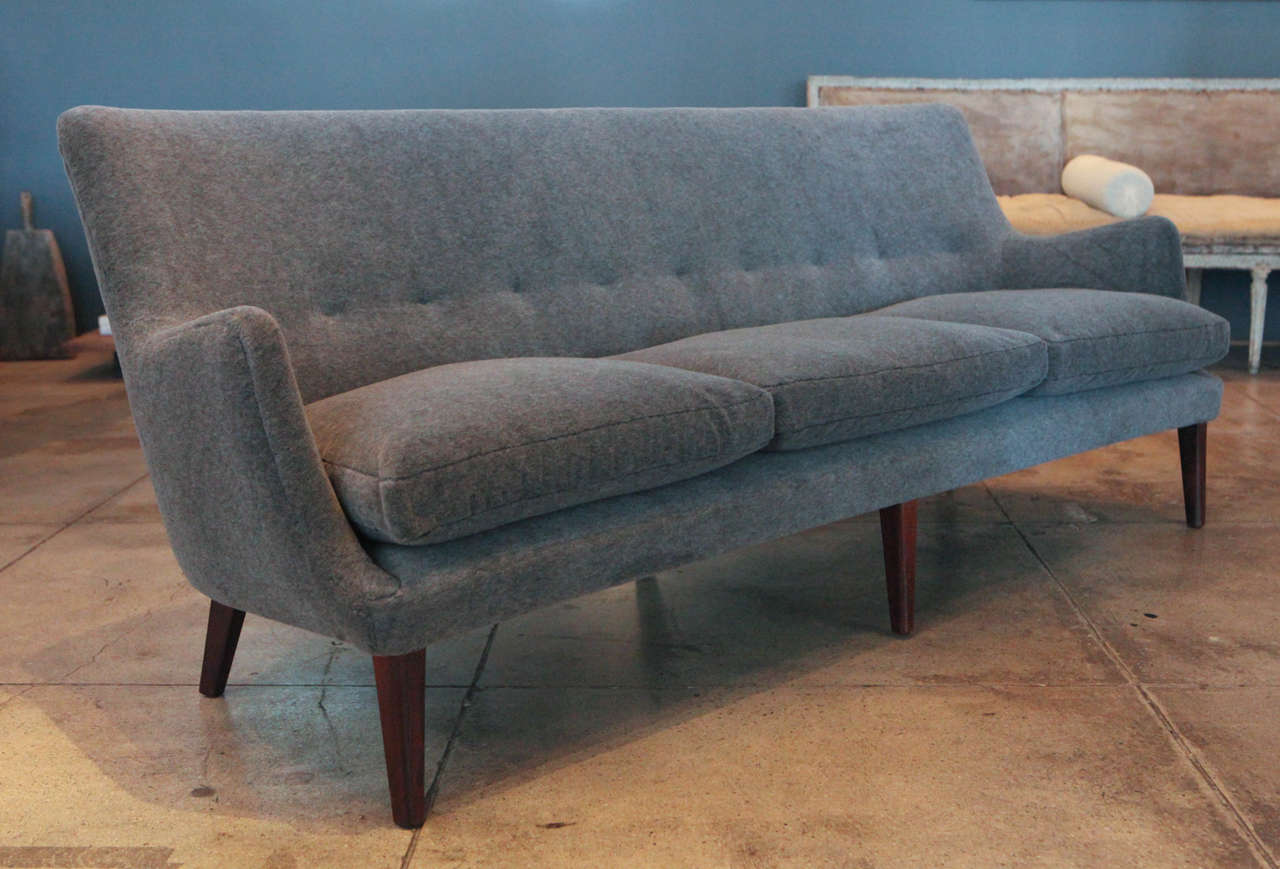 Our favorite of Arne Vodder designs newly upholstered in French gray mohair with rosewood frame.