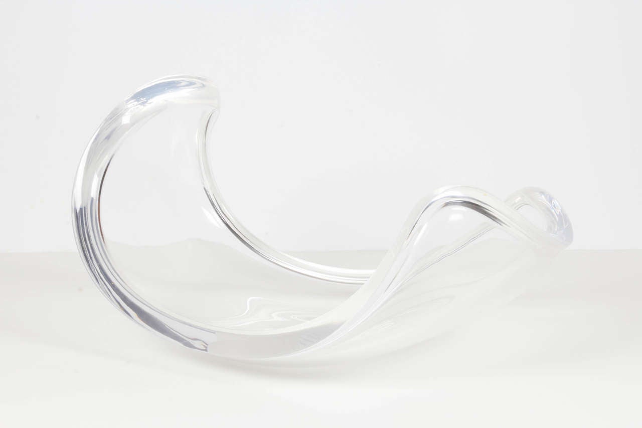 Eye catching bowl of thick lucite sculpted in a wonderful free form. This is the largest size Ritts produced from their Astrolite series. This is versatile: It can be a centerpiece, fruit bowl, or salad bowl. In fact it comes with the very rare pair