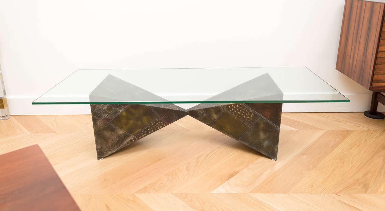 Patinated steel "Pyramid" cocktail table by Paul Evans.
Replaced glass top.