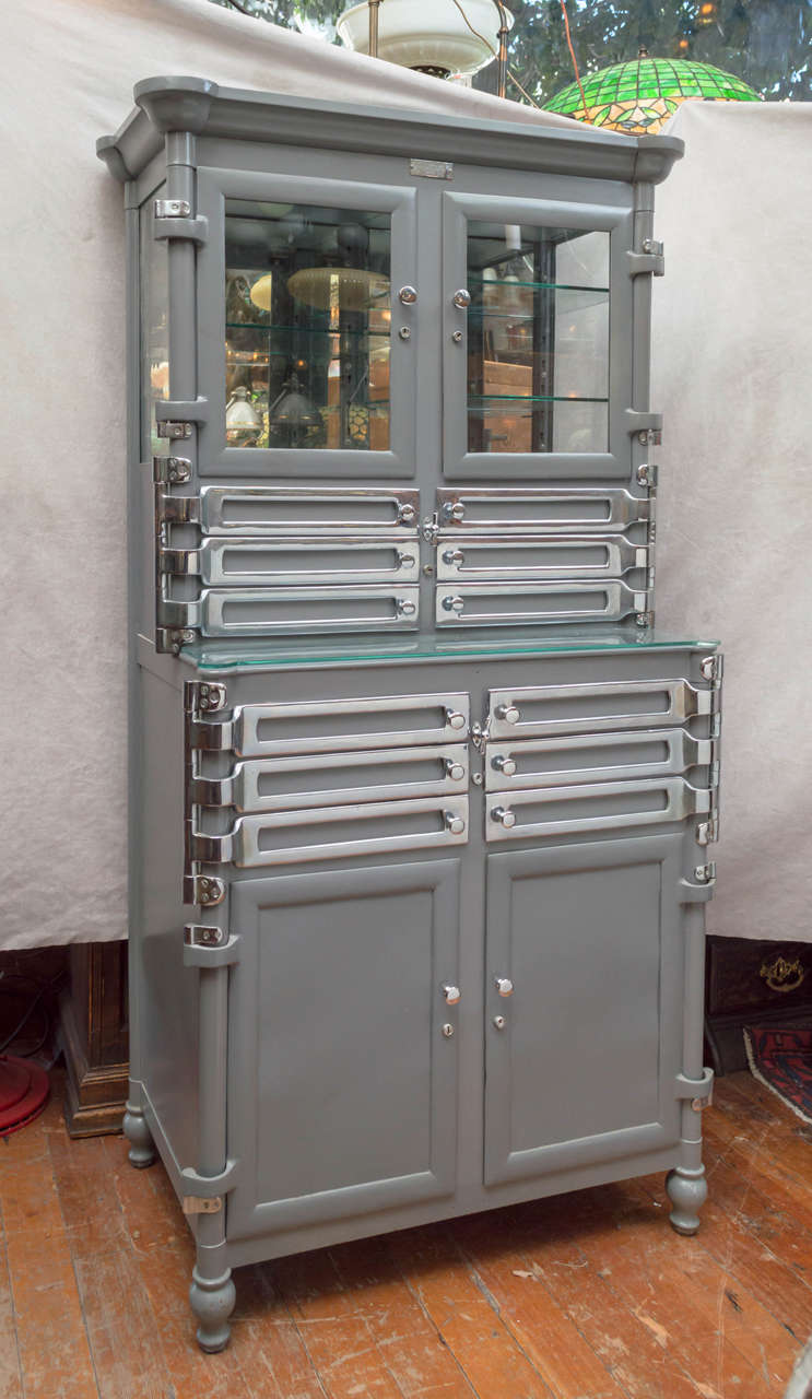 We rarely purchase metal furniture,and we have had a shop for over 40 years in San Francisco. We made an exception here. This incredible cabinet is a sight to behold. So many swing out drawers, cabinet space,and meticulously restored. The nickel