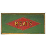 painted advertising sign proclaiming MEATS