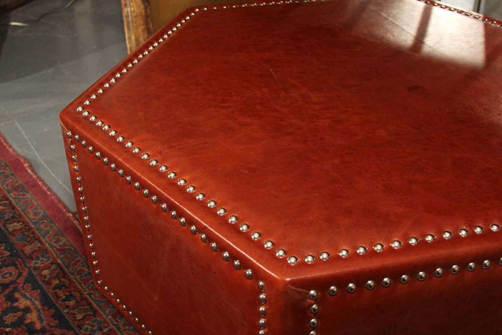 leather and nailhead upholstered ottoman/coffee table 1