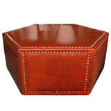 leather and nailhead upholstered ottoman/coffee table