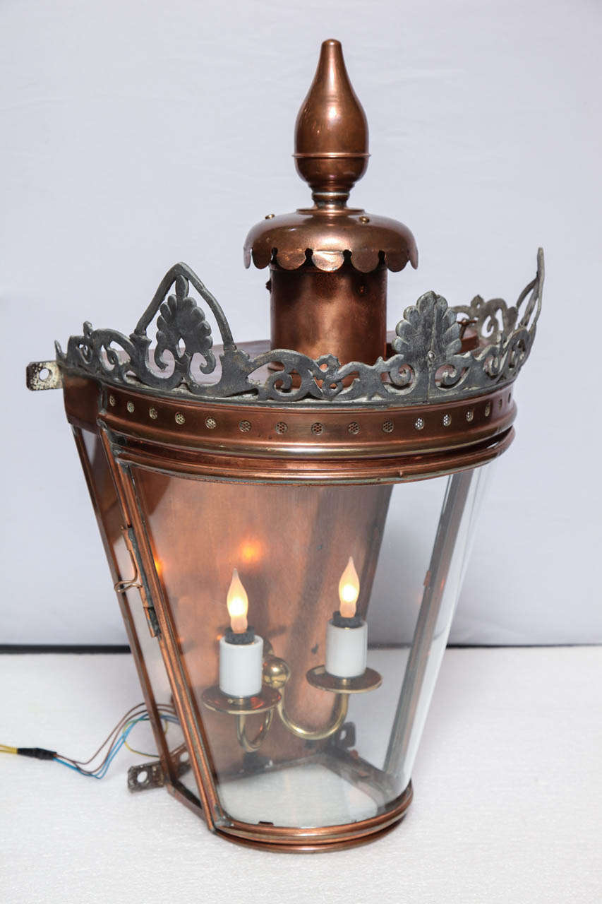 Bow fronted copper wall lantern, UK, circa 1850.