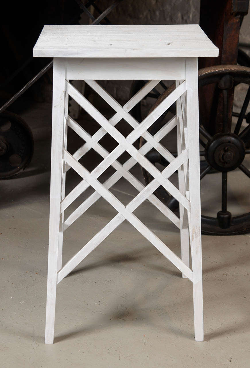 This pair of tables was re-interpreted from an early 20th century plant stand.
It functions well as an end table or plant Stand for the porch or living room
Graphic lines and function make this a 
