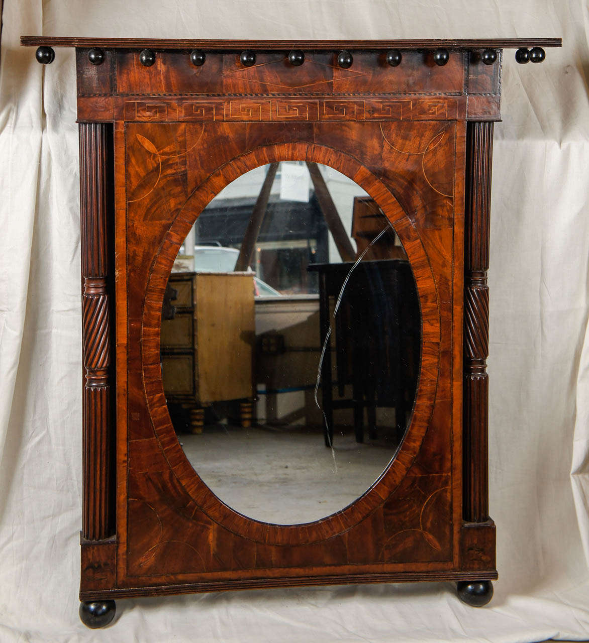 A beautiful example of an American late Federal mirror
inlaid with multiple woods. An 
