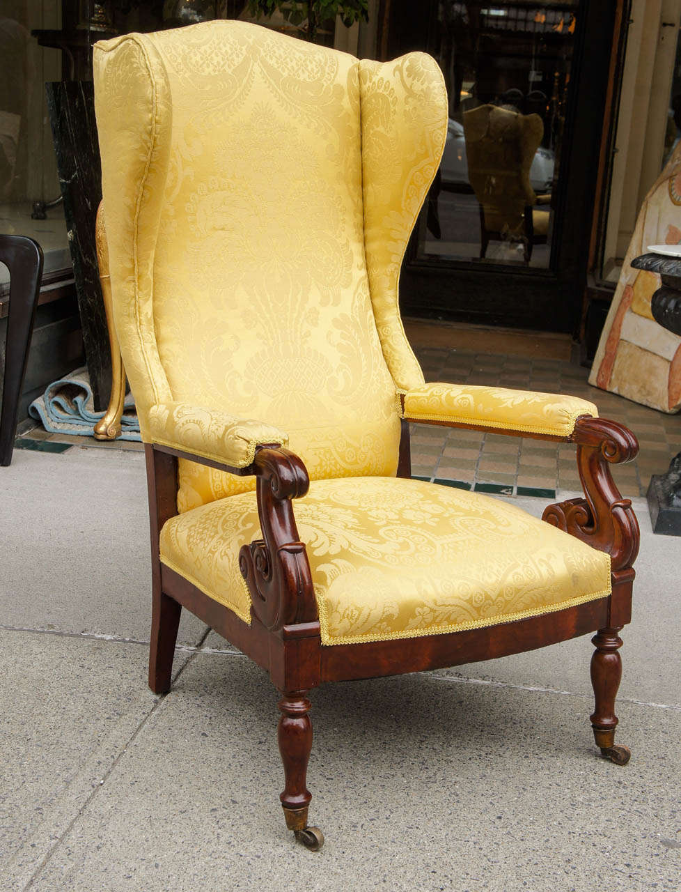 This chair showing fine classical styling was made in Boston circa 1820. Its style and shape relate to French Restoration design  and was practiced in this country by such designers as Thomas Voss, Honore Lannuier and Duncan Phyfe. The chair has a
