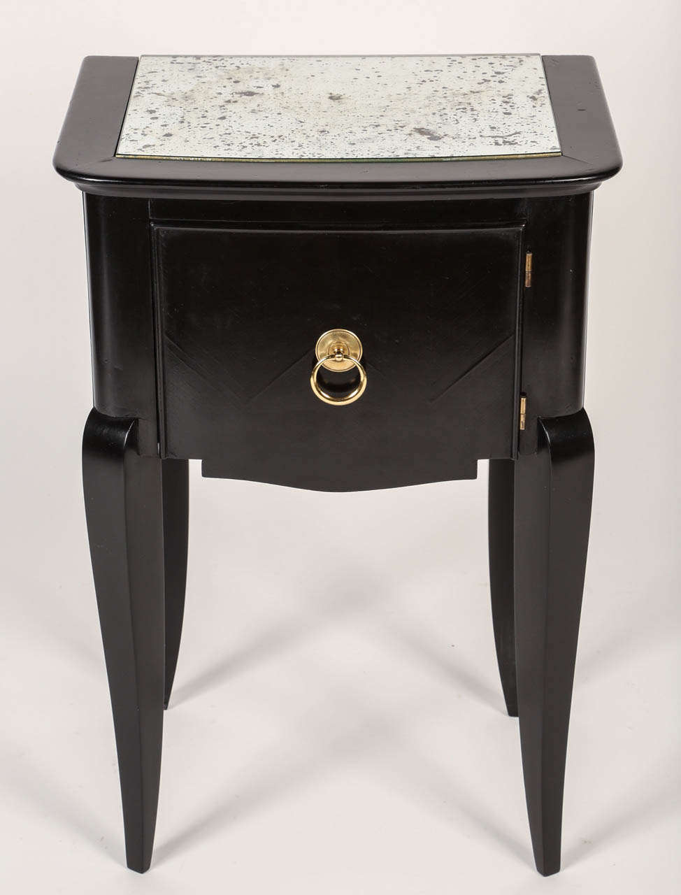 Elegant pair of black side tables in the manner of André Arbus.