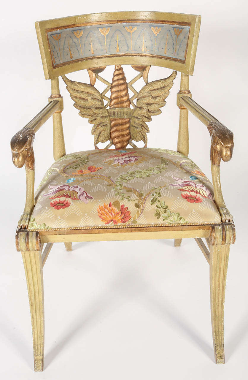 A spectacular painted and parcel-gilt fauteuil from the collection of James Perkins at Aynhoe Park. Leaf-decorated toprail and a drop-in seat of channelled sabre legs. The seat has been newly upholstered in silk Lampas fabric by Prelle, France.