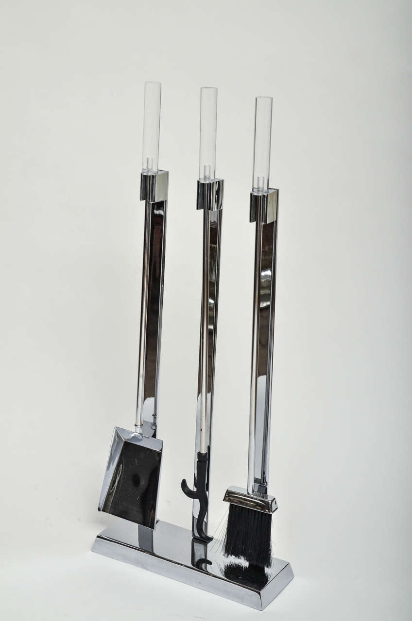 Chrome fireplace tool set with Lucite handles.