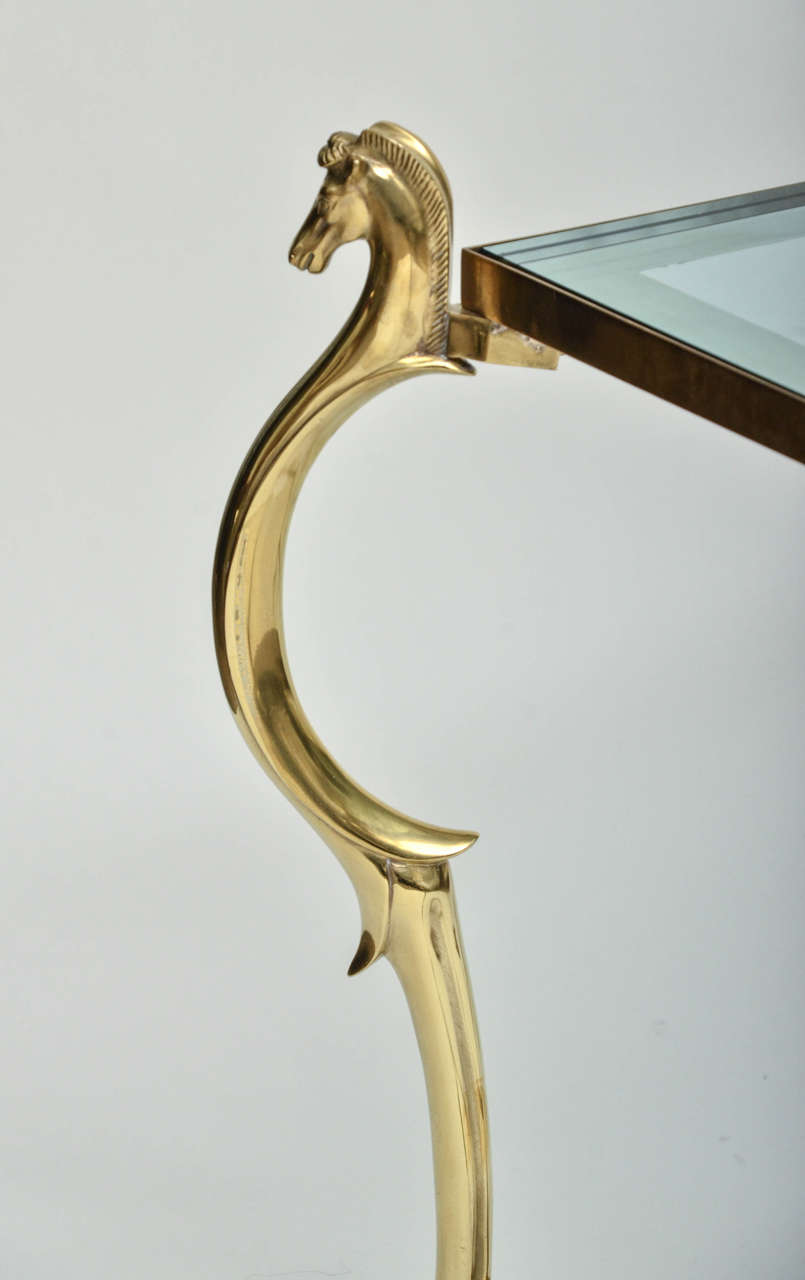 Italian Pair of Curvilinear Brass Side Tables with Horse Head Finials