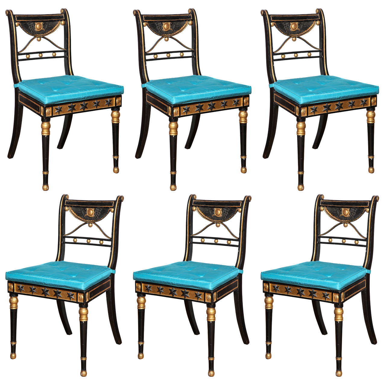 Set of 19th Century Ebonized and Parcel Gilt Egyptian Revival Regency Chairs For Sale