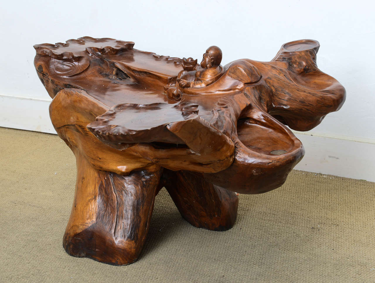 Amazing custom table, a sculptural work of art dating back to the 1960-1970s table has a custom built in brass CAP for placing incense and a hand-carved Buddah figure, entire top is hand-carved and it houses several levels (see photos ). A very