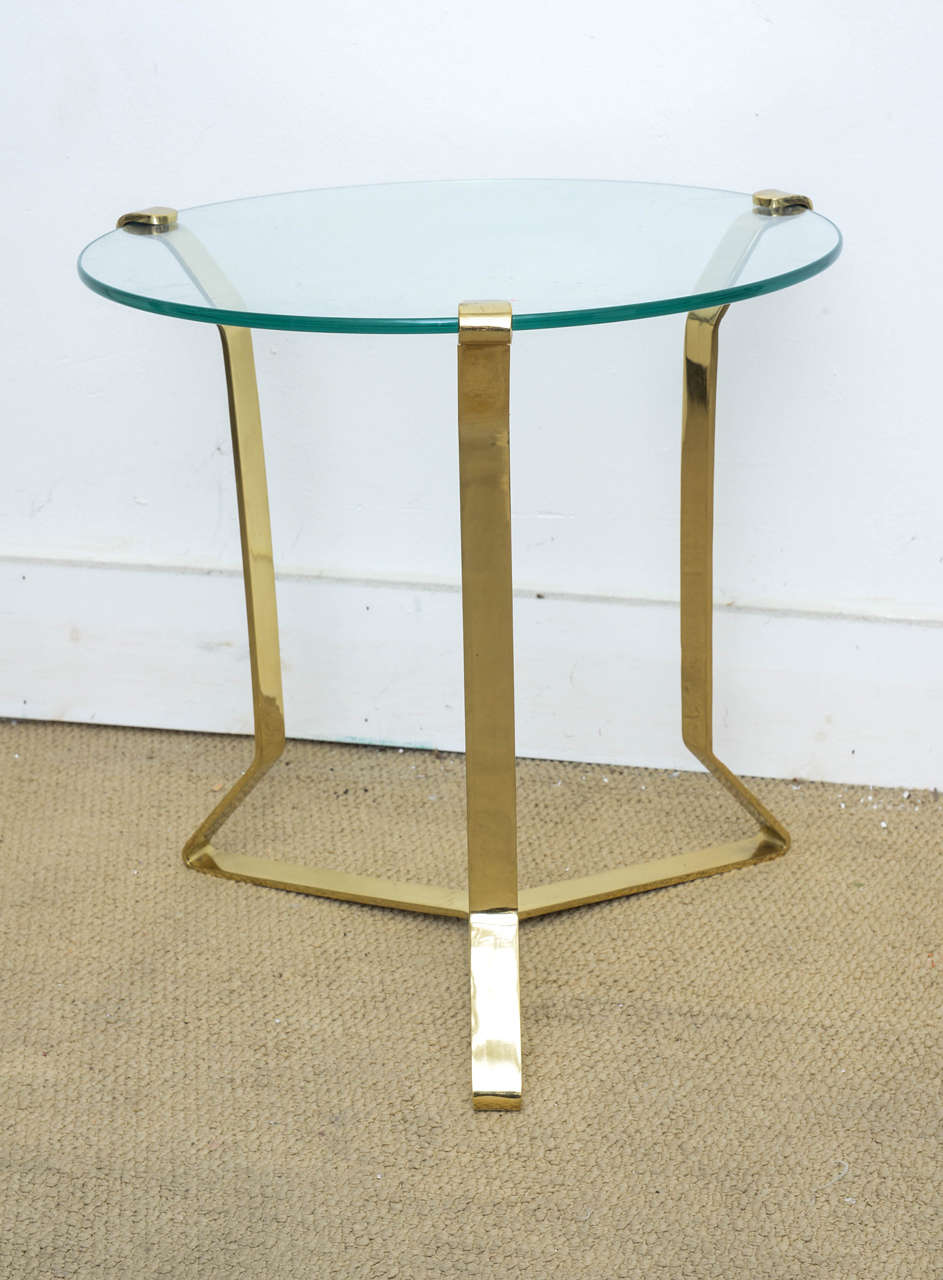 Beautiful pair of side polished brass tables dating from the late 1970s. Glass and brass is in excellent condition. Great simple design ideal for a classic, modern or eclectic interior. Note price per pair.