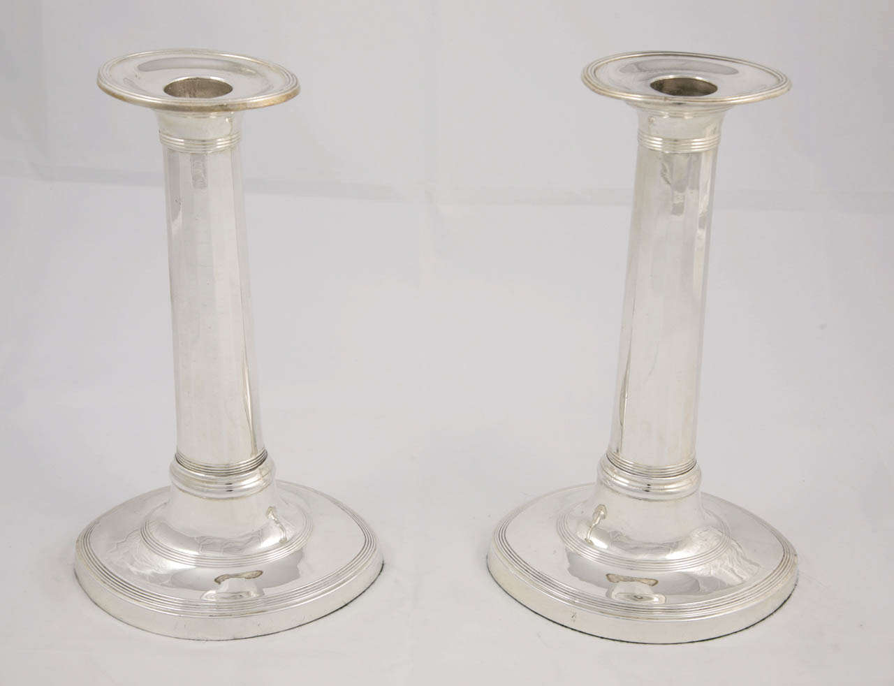Pair of oval based early sheffield plate candlesticks c.1790 (Replated)