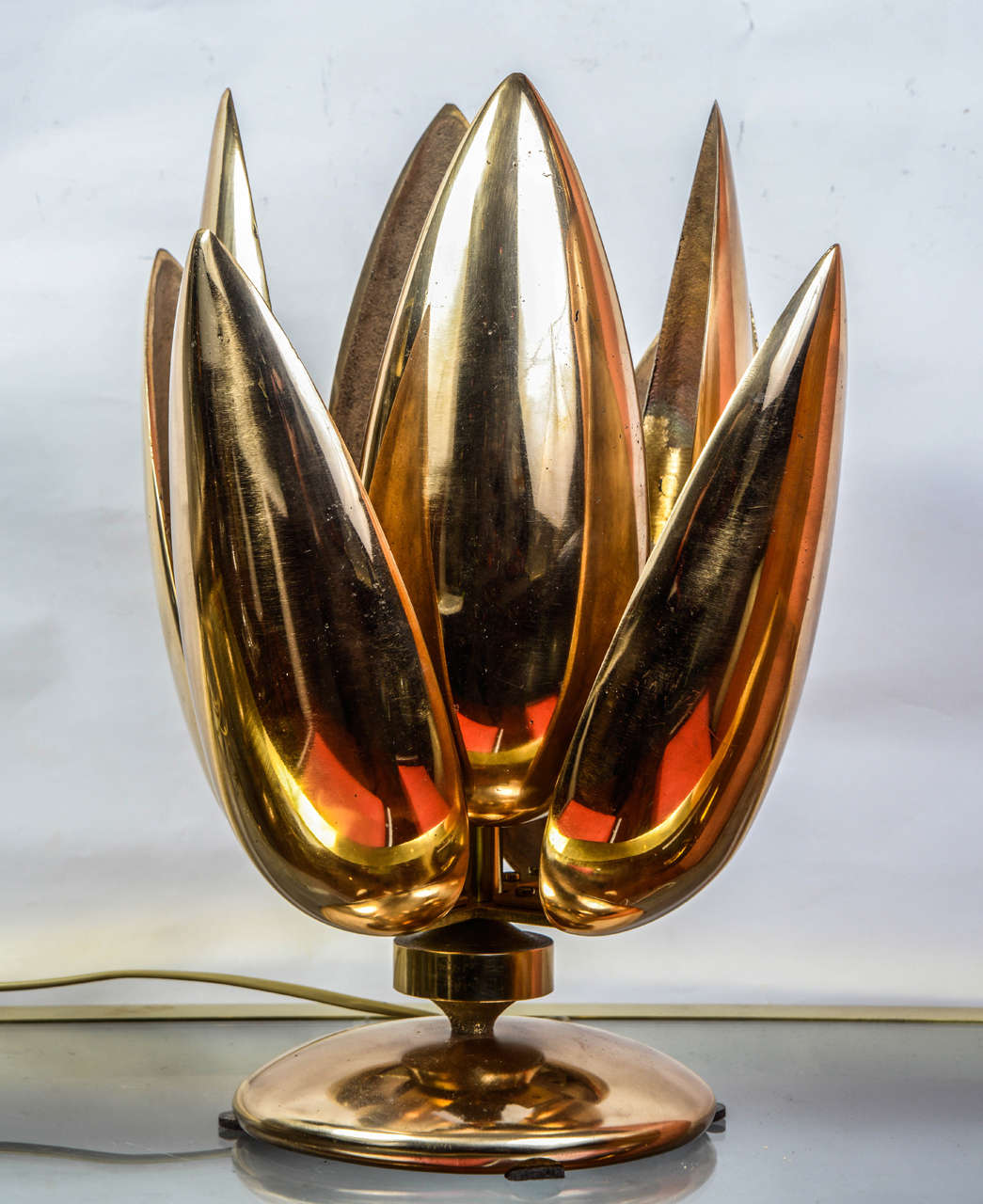 Pair of sculptural polished bronze table lamps.
