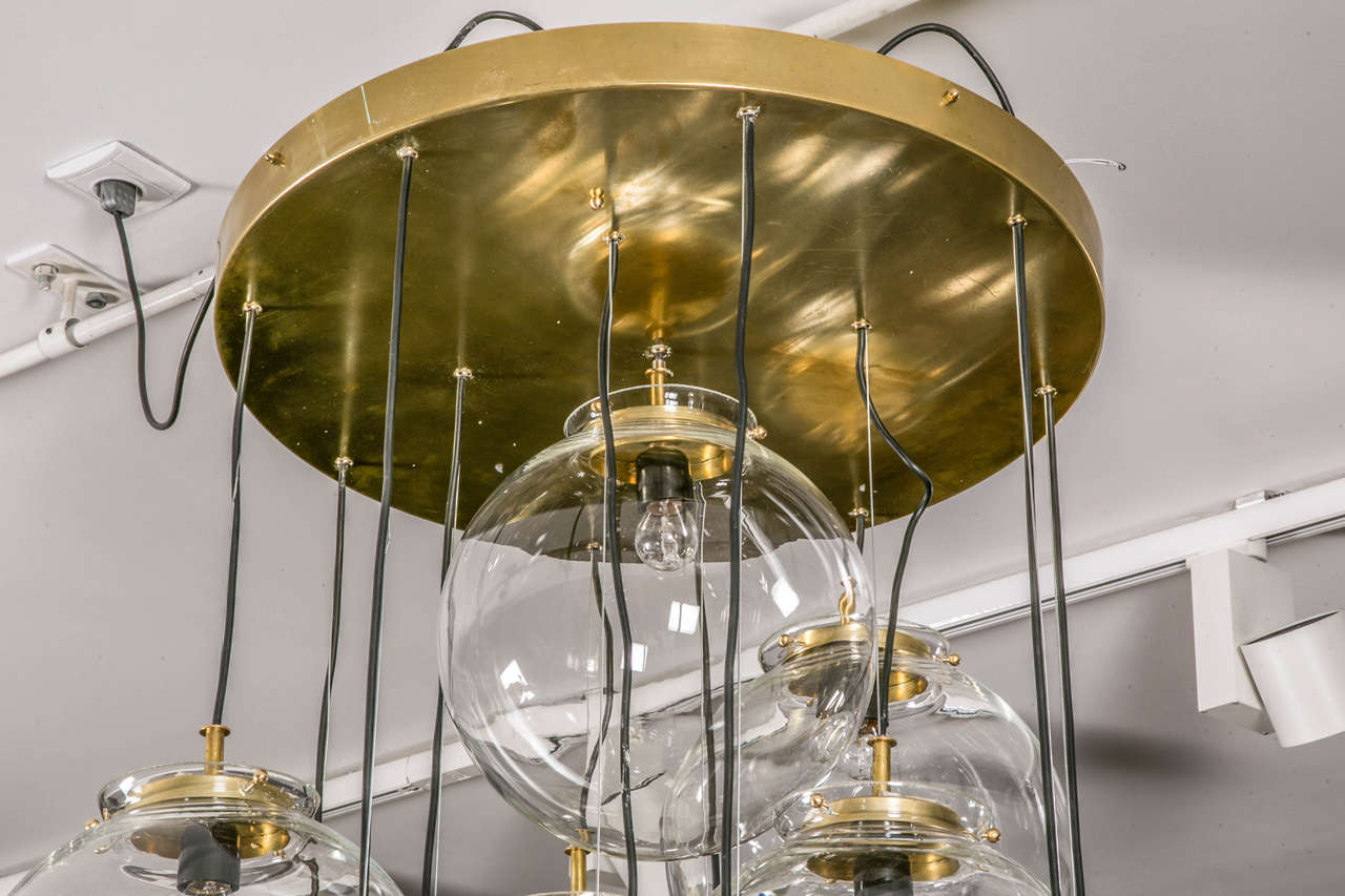 Brass Pendant Chandelier with Thirteen Glass Globes For Sale
