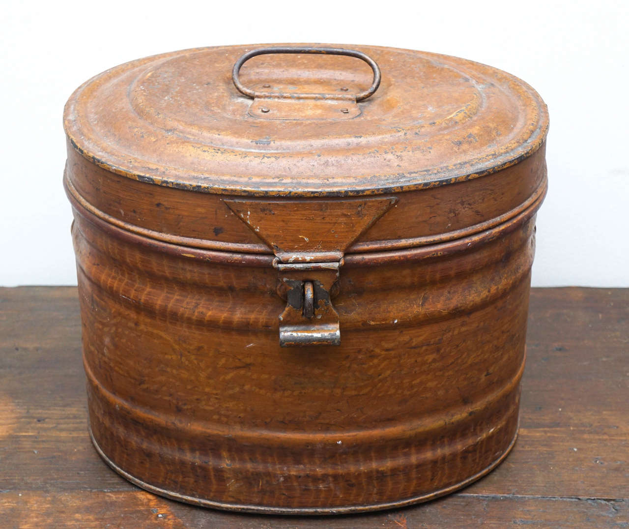 This is what luggage looked like in the 1800s. In England it was mostly made of tin and metal. This particular piece was for hats. Original blue paint inside. What a nice accessory on top of a piece of furniture in a den or bedroom!