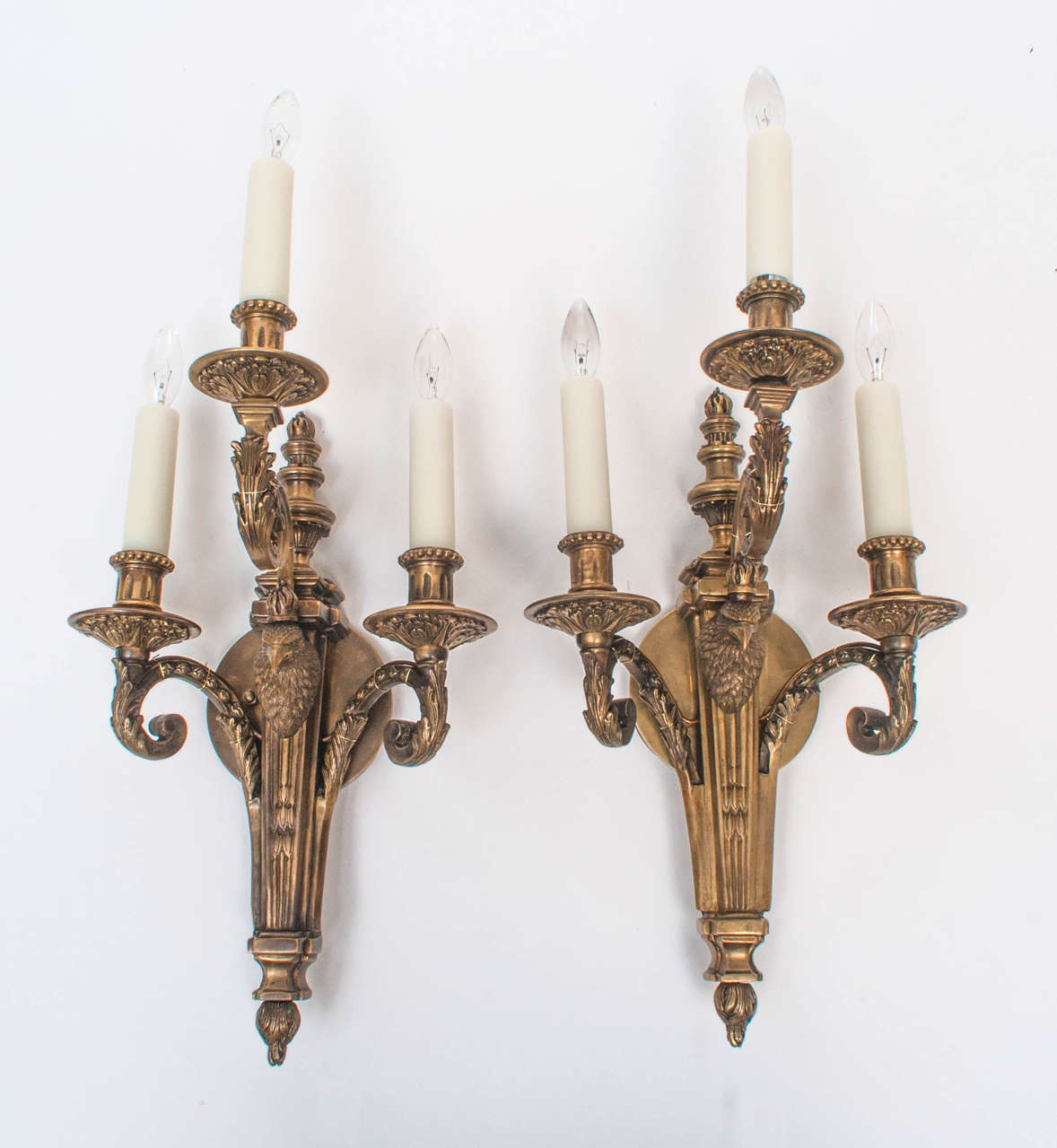 Pair of Hand-Cast Bronze Three-Light Eagle Head Sconces with Foliate Decoration