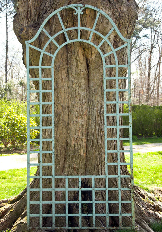 A wrought-iron trellis.