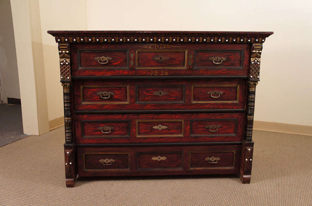 This is an outstanding and unique chest of four drawers in original decorative paint.  In over thirty years in the antique pine business we have never seen another even slightly like it which is why it has been in the owner's personal collection for